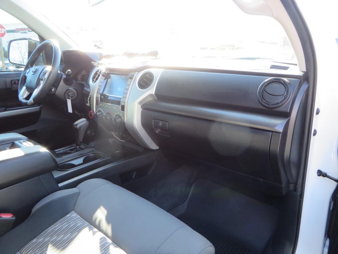 2020 White /GREY Toyota Tundra SR5 (5TFDY5F19LX) with an 5.7L engine, automatic transmission, located at 2630 Grass Valley Highway, Auburn, CA, 95603, (530) 508-5100, 38.937893, -121.095482 - Features - King Off Road adjustable remote reservoir coil overs, King 2.5 adjustable remote reservoir rear shocks, Method Race wheels, Falken Wildpeak tires, Sliders, Bed braces, Borla Exhaust, Husky floor mats, Window tint, and Ram phone mounts. - Photo#46